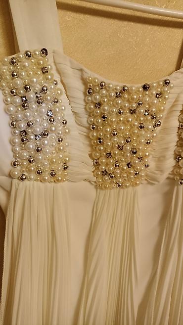 Ziyafət donları: Ağ don,2dəfə geyinilib.200azn alınıb — 5