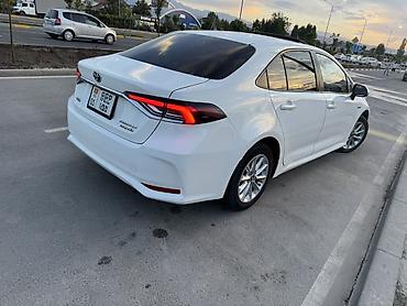 byd e6: Toyota Corolla: 2021 г., 1.8 л, Вариатор, Гибрид, Седан — 3