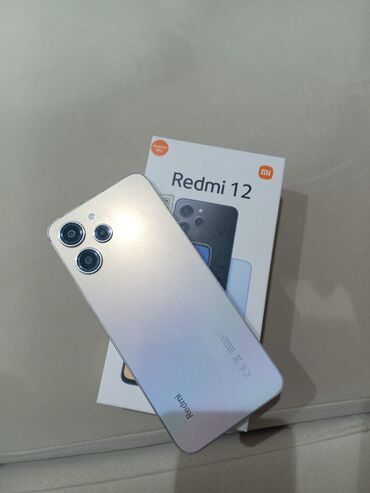 telefon zəngləri: Xiaomi Redmi 12, 128 ГБ, цвет - Серебристый, 
 Две SIM карты, Face ID, С документами