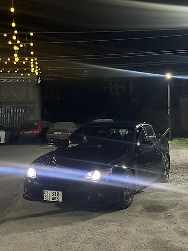 глушитель на 124: Юбка переднего бампера Subaru, 2004 г., цвет - Черный, Б/у — 1