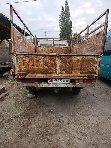 34 е: Грузовой бортовой микро-грузовик с высокой металлической платформой — 5