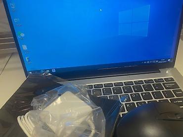 mac mini 2010: Ноутбук с экраном 14", тонкие рамки. Корпус серебристый, островная — 1