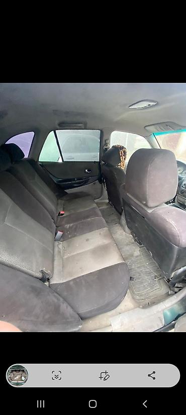 mazda 2000: Mazda 323: 2003 г., 1.6 л, Механика, Бензин, Хэтчбэк — 4