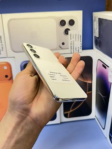 tab 9: Samsung Galaxy S23 - Память: 8/256 GB - Цвет: белый - Тройная — 4
