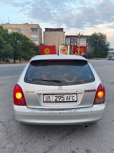 корай 5: Mazda 323: 2003 г., 1.6 л, Механика, Бензин, Универсал — 4