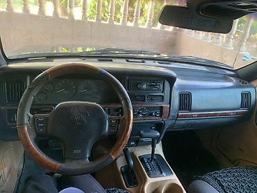 Jeep: Jeep Grand Cherokee (ZJ), tünd yaşıl rəng, V8 mühərrik. Texniki və — 5