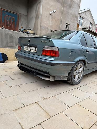 5 karopka: BMW 3 series: 1.6 l | 1994 il Sedan — 1
