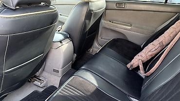 тутойт дымит: Toyota Camry: 2003 г., 2.4 л, Автомат, Бензин, Седан — 6