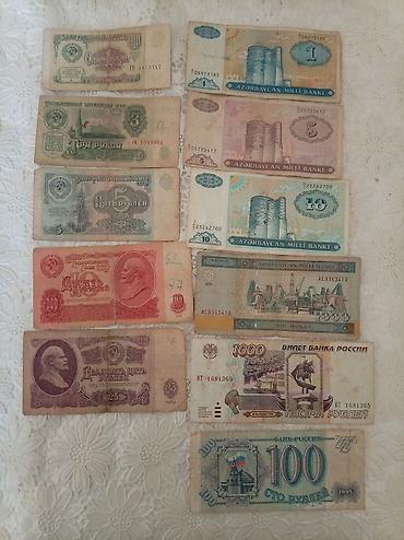 200 dollar nece manatdir: 1000 Manat, 2001 il — 1