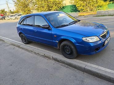 шина ош: Mazda Familia: 2002 г., 1.6 л, Кол менен иштөөчү, Бензин, Универсал — 2