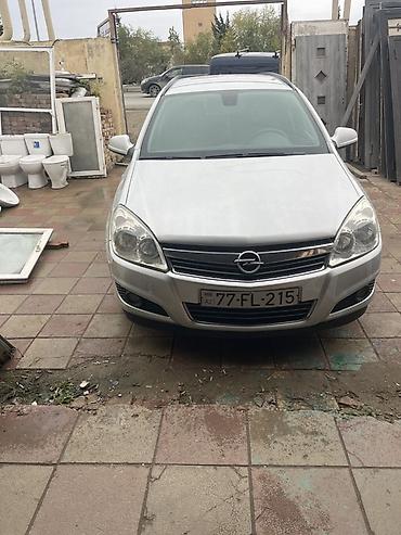 lada kalina 2008: Opel Astra Caravan (universall) – gümüşü rəng Xüsusiyyətlər: - Kuzov — 1