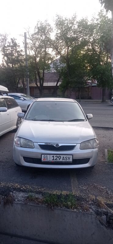 Mazda: Mazda Familia: 2000 г., 1.5 л, Автомат, Бензин, Седан