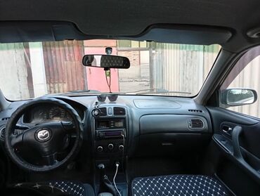 купить трактор мтз 82 бу в москве: Mazda 323: 2002 г., 1.6 л, Механика, Бензин, Универсал