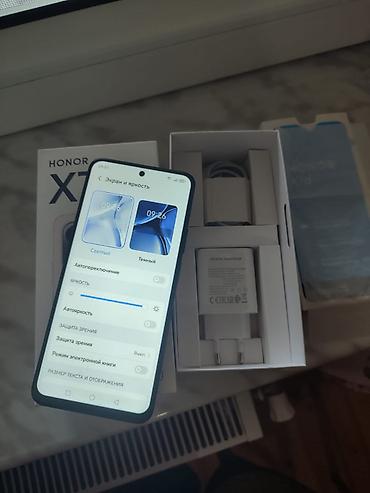 6500 slide: Honor X7d, 128 GB, rəng - Qara, İki sim kartlı, Barmaq izi, Face ID — 6