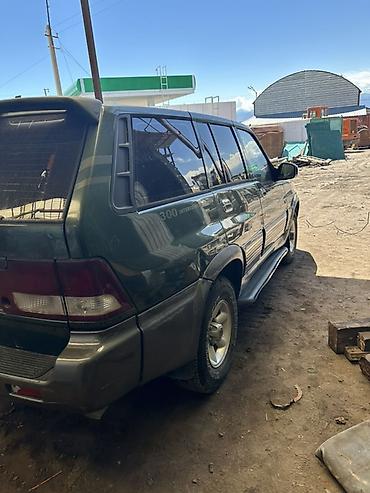 hongqi e: Ssangyong Musso: 2002 г., Механика, Дизель, Внедорожник — 4