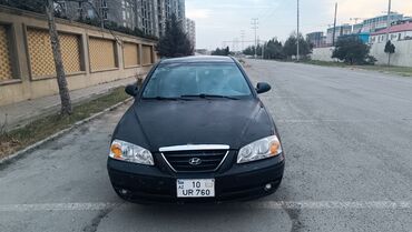 Hyundai Elantra: 1.6 л | 2005 г. Седан