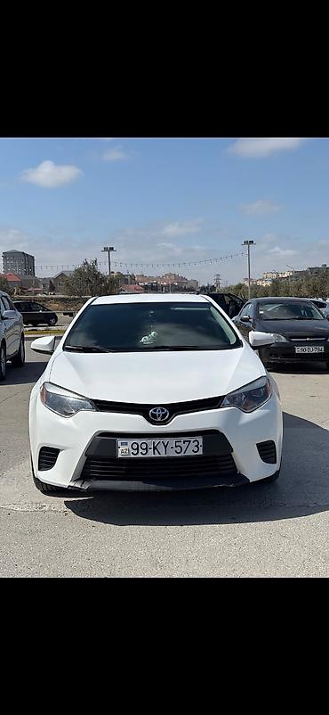 corolla 2006: Toyota Corolla, ağ rəng,sedan gövdə. I - Nömrə nişanı: 99-KY-573 — 10