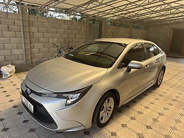 Toyota Corolla: 2020 г., Гибрид, Седан
