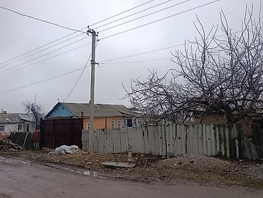 Продажа коттеджей и домов: Продаётся одноэтажный частный дом с участком и воротами. участок 7 — 10