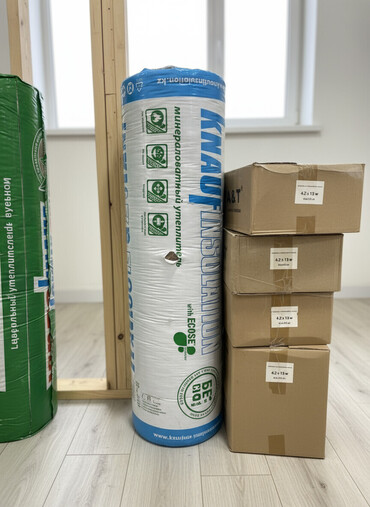 утеплитель потолков: Рулон минераловатного утеплителя Knauf Insulation. Подходит для