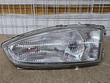 Передние фары: Передняя левая фара Mitsubishi 1997 г., Б/у, Оригинал, Германия — 2