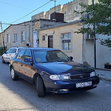 qəzali: Kia Clarus: 2 l | 1997 il Sedan — 3