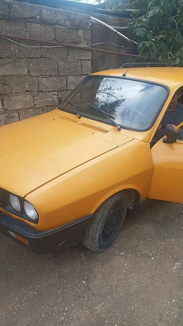 guzgu: Model: Dacia 1310 Break (universal kuzov) Rəng: sarı Kuzov: 5 qapılı — 2