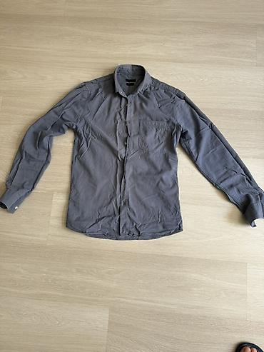 alt pal: Kişi köynəyi – uzunqollu, düyməli model. - Rəng: tünd boz. - Yaxa — 1