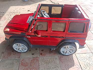 купить коляску анекс бу: Uşaq üçün elektrikli mini avtomobil – G‑Class üslubunda, qırmızı rəng — 1