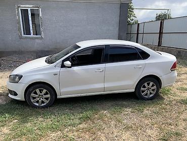 transporter multivan: Volkswagen Polo: 2012 г., 1.6 л, Механика, Бензин, Седан — 2
