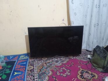 пс 2 слим: Телевизор с плоским экраном, диагональ ориентировочно 43–50 дюймов