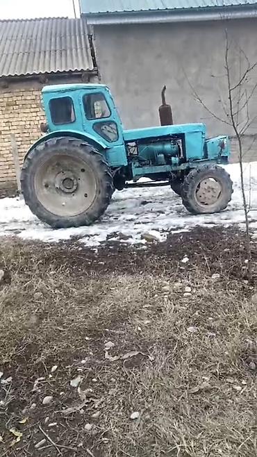 жоский буксир: Трактор колесный, класс тяги примерно 1,4–2,0. Кабина закрытая — 1