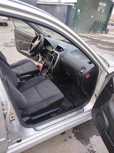 maserati купить: Mitsubishi Carisma: 2004 г., 1.6 л, Механика, Бензин, Лифтбек — 3