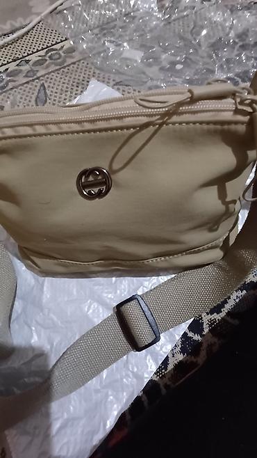 Классические сумки: Продаётся женская сумочка с длинным ремнём,материал плащёвка мягкая at lalafo.kg — 7 Классические сумки: Продаётся женская сумочка с длинным ремнём,материал плащёвка мягкая — 7