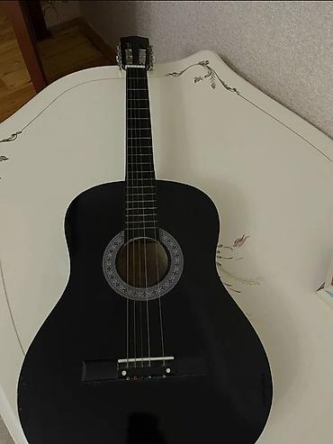 gitar satisi: Qeyd edmki simlər təzə dəyişilib təzələnib. Və hərbiri yeni köklənib — 2