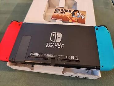 Nintendo Switch: 🎮 Nintendo Switch 32GB + 1TB microSD ✅ Odlično stanje (skoro kao — 4