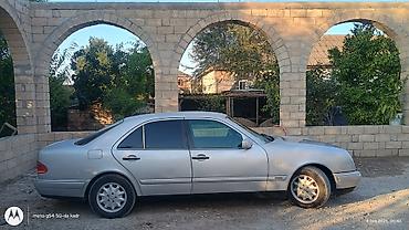 фольксваген пассат 1: Mercedes-Benz E 200: 2 л | 1997 г. Седан — 5