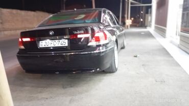BMW 745i, qara rəngli sedan. 2500 manat ilkin odenis Hall hazırda