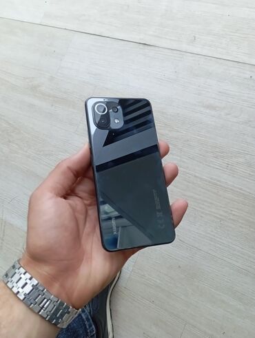 xiaomi mi a3 128gb qiymeti: Xiaomi Mi 11 Lite, 128 GB, rəng - Boz, 
 Düyməli, Barmaq izi, İki sim kartlı