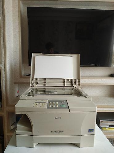 tercume aparati: Şəkildə gördüyünüz Canon SmartBase PC1210D modelidir. Bu — 1