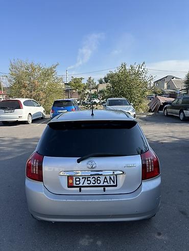 low ll: Toyota Allex: 2003 г., Автомат, Бензин, Хэтчбэк — 4