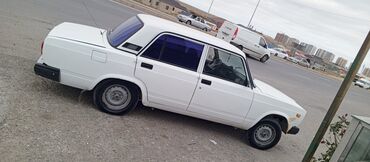 фольксваген поло комплектации и цены: Model: VAZ 2107 (LADA), ağ rəng, 4 qapılı sedan Xüsusiyyətlər: - Sadə