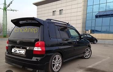 мазла: Спойлер на Mazda Tribute / Ford Escape (первого поколения, кузов — 2