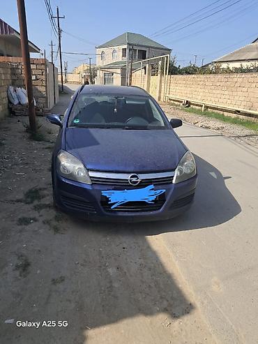 5 karopka: Opel Astra: 1.6 l | 2006 il 225000 km Universal — 1