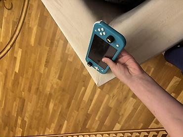 nintendo switch 3 lite: Nintendo Switch Lite – türkuaz rəngdə portativ oyun konsolu — 2