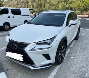 фары для нексии: Белый внедорожник Lexus NX 300 с характерным дизайном решетки