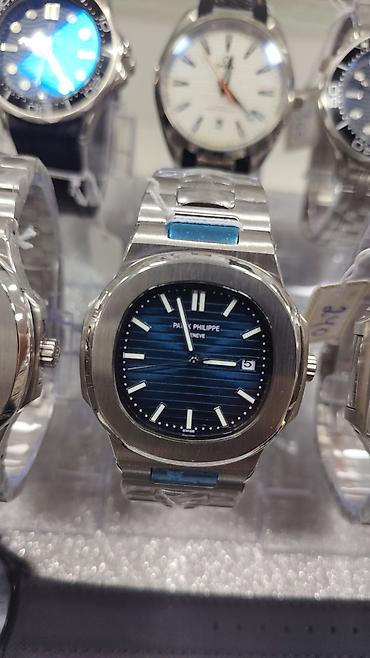 bakida saat: Patek Philippe Nautilus üslubunda kişi saatları – polad korpus və — 3