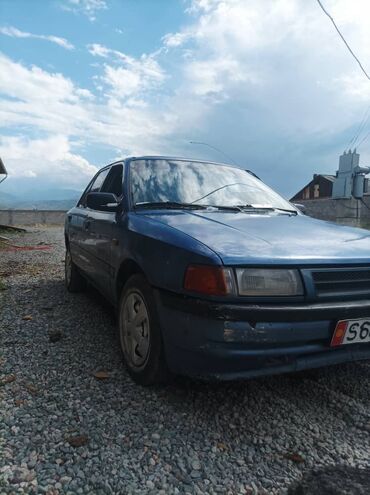 машина на: Mazda 323: 1990 г., 1.6 л, Механика, Бензин, Седан