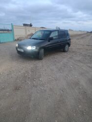дефлектор воздуховода: Mazda : 2002 г., 1.4 л, Автомат, Бензин, Хетчбек