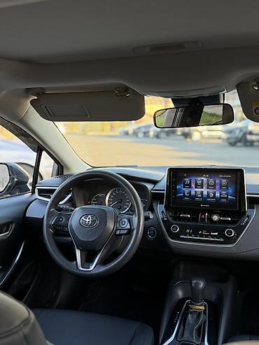 byd e9 1: Toyota Corolla: 2019 г., 1.8 л, Вариатор, Гибрид, Седан — 10